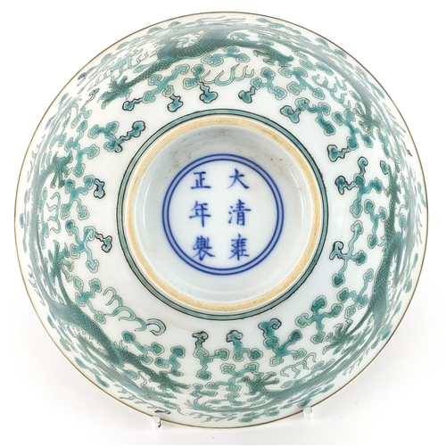 498 - Chinese porcelain bowl decorated in green with dragons chasing a flaming pearl amongst clouds, six f... 