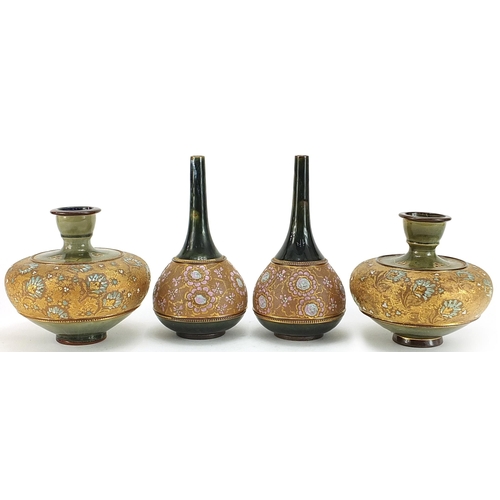 317 - Two pairs of Doulton Slater's patent stoneware vases hand painted with flowers, the largest pair eac... 