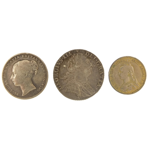 1573 - George III and later silver coinage comprising 1787 and 1867 shillings and an 1887 enamelled sixpenc... 