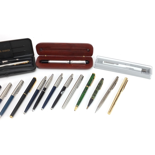 190 - Vintage and later pens and pencils including a large white metal example housed in a hardwood case w... 