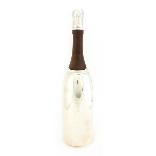 125 - Silver plated cocktail shaker with turned wood handle in the form of a Champagne bottle, 38cm high