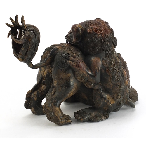 288 - Chinese partially gilt bronze incense burner in the form of two qilins, 30cm wide