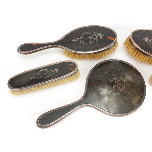 2275 - George V five piece silver and tortoiseshell pique work dressing table set, possibly by Corke & Apth... 