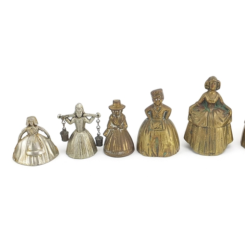 1107 - Twelve brass and white metal Crinoline Lady table bells, the largest 10.2cm high