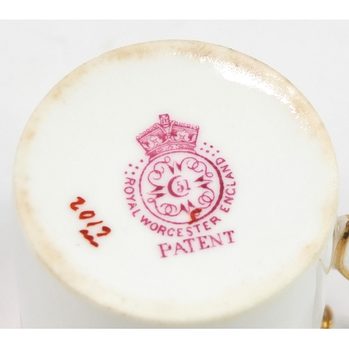 1067 - Royal Worcester part coffee service gilded with flowers comprising coffee pot, four coffee cans with... 