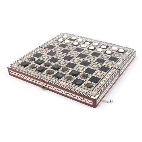 1380 - Moorish style inlaid folding games board, 8cm H x 40.5cm W x 20cm D when closed