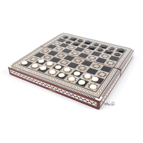 1380 - Moorish style inlaid folding games board, 8cm H x 40.5cm W x 20cm D when closed