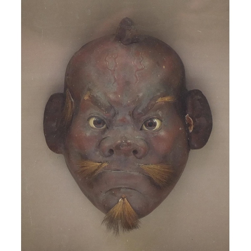 236 - Japanese lacquered Noh mask with beaded eyes housed in a glazed display case, the mask approximately... 