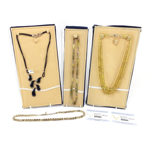 2176 - Four semi precious stone necklaces with silver clasps some with certificates including lemon citrine... 