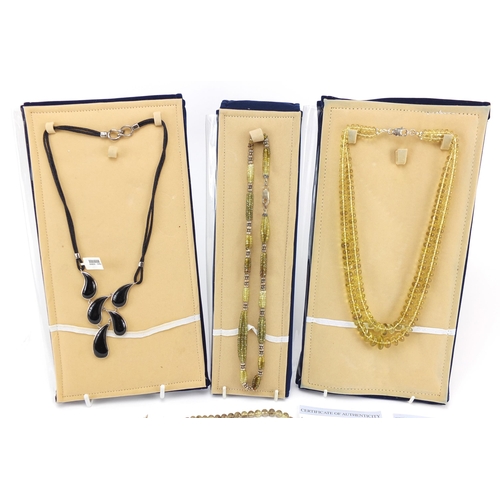 2176 - Four semi precious stone necklaces with silver clasps some with certificates including lemon citrine... 