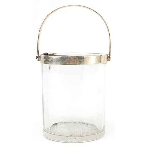 2215 - Hukin & Heath Ltd, George V silver mounted cut glass preserve jar with mechanical action swing handl... 