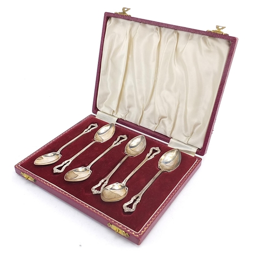 2227 - Henry Clifford Davis, set of six Art Nouveau style silver teaspoons housed in a velvet and silk line... 