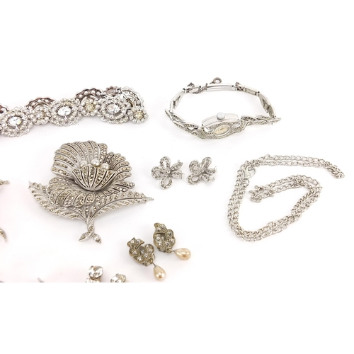 2138 - Collection of white metal marcasite and clear stone jewellery including wristwatch, brooches, neckla... 