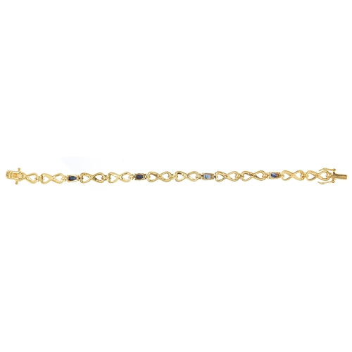 1822 - Silver gilt sapphire and clear stone bracelet, 18cm in length, 9.8g