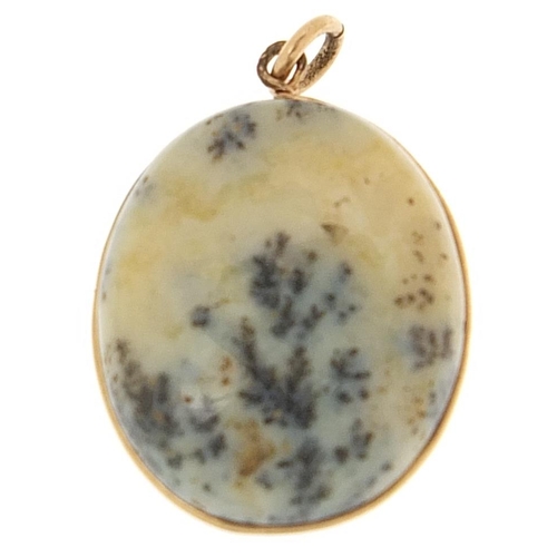 2078 - Unmarked gold and moss agate compass pendant, tests as 9ct gold) 2.5cm high, 6.0g