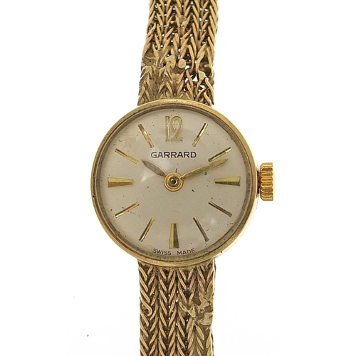 1647 - Garrard, ladies 9ct gold wristwatch with 9ct gold strap, 17mm in diameter, total weight 16.5g