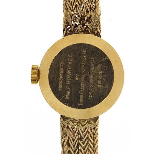 1647 - Garrard, ladies 9ct gold wristwatch with 9ct gold strap, 17mm in diameter, total weight 16.5g