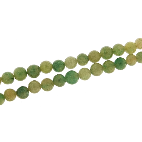 2162 - Chinese green jade bead necklace, 84cm in length, 73.2g