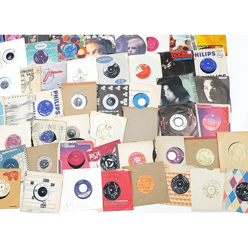 1437 - Collection of 45rpm records including Hot Chocolate, Slade, Buddy Holly, Gary Glitter, Status Quo, W... 