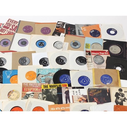 1450 - Collection of 45rpm records including Ringo Starr, Simply Red, Elvis Presley and Rod Stewart