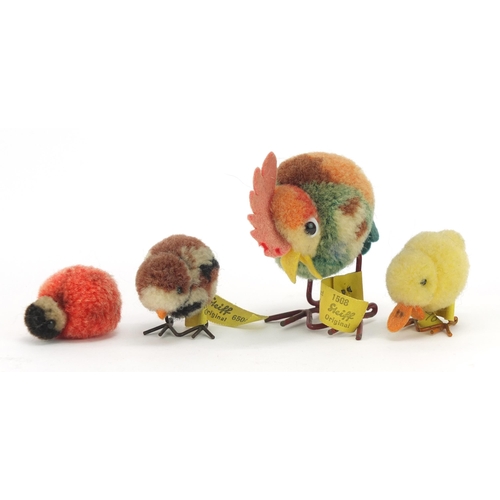 1349 - Three vintage Steiff chicks and a chicken, the largest 5.5cm high