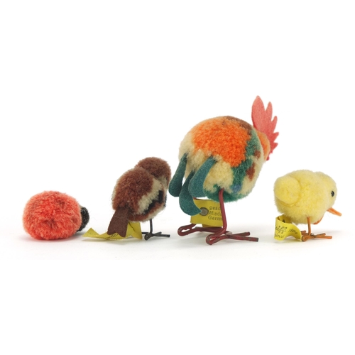 1349 - Three vintage Steiff chicks and a chicken, the largest 5.5cm high