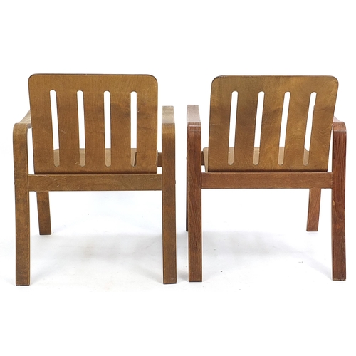 827 - Pair of mid century bent plywood armchairs, 74cm high