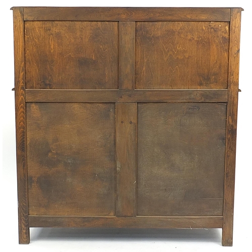 872 - Ipswich oak court cupboard with a central door above two frieze drawers and pair of cupboard doors, ... 