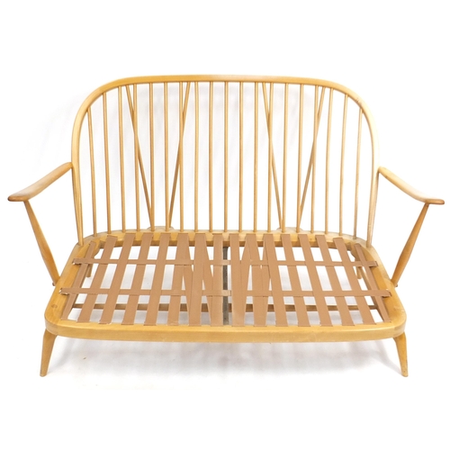 819 - Ercol light elm Windsor two seater settee, 134cm wide