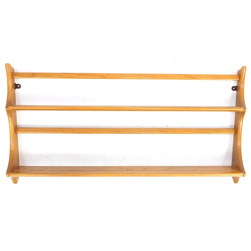 875 - Ercol light elm wall hanging plate rack, 50cm H x 97cm W x 13cm D