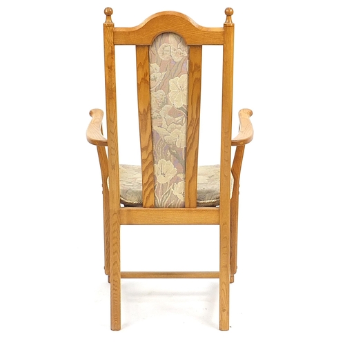 880 - Ercol ash and elm carver chair, 106cm high