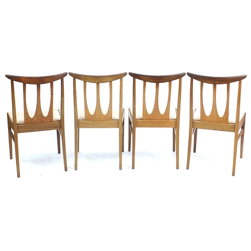 798 - G Plan E-Gomme, mid century teak extending dining table with four chairs, the table 73.5cm H x 147cm... 