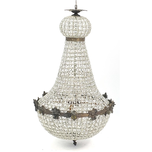 852 - Large ornate chandelier with bronzed metal mounts, 90cm high