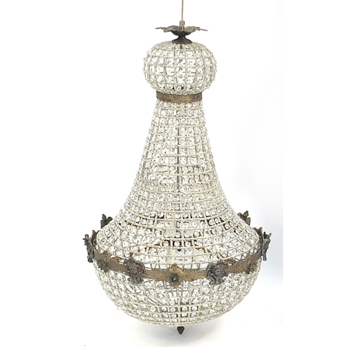 853 - Large ornate chandelier with bronzed metal mounts, 90cm high