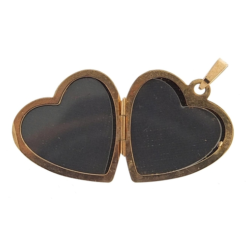 1769 - 9ct two tone gold love heart locket engraved with flowers, 2.5cm high, 1.8g