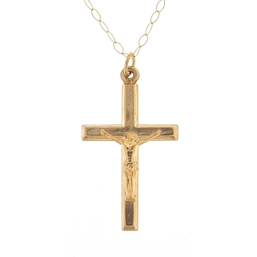 1980 - 9ct gold crucifix pendant on a 9ct gold necklace housed in a bible design box, 2.5cm high and 40cm i... 