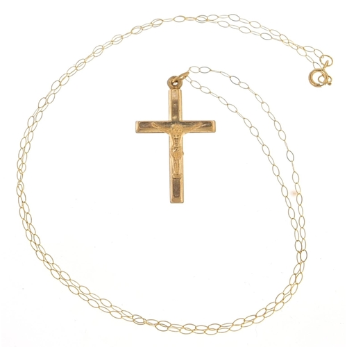 1980 - 9ct gold crucifix pendant on a 9ct gold necklace housed in a bible design box, 2.5cm high and 40cm i... 