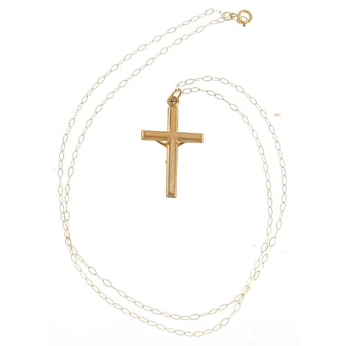 1980 - 9ct gold crucifix pendant on a 9ct gold necklace housed in a bible design box, 2.5cm high and 40cm i... 