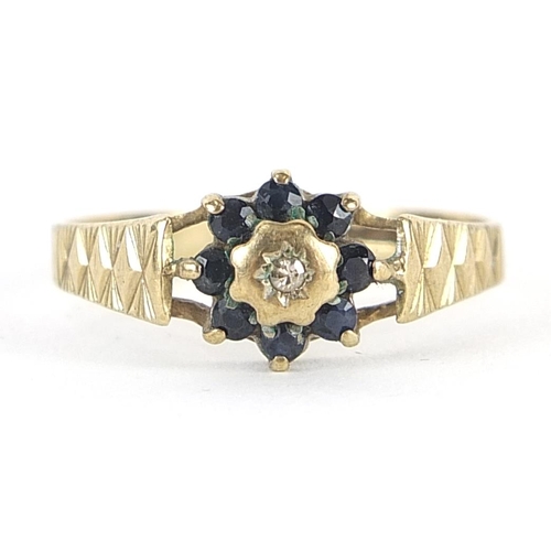 1768 - 9ct gold diamond and sapphire flower head ring, size O, 1.6g