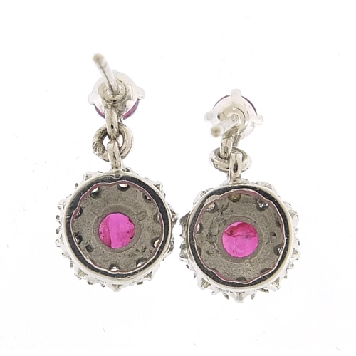 1782 - Pair of 18ct unmarked white gold ruby and diamond cluster drop earrings, 1.6cm high, 3.7g