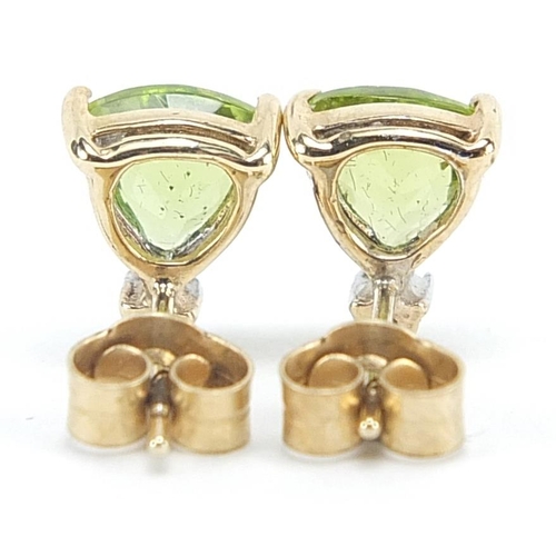 1922 - Pair of unmarked 9ct gold peridot and diamond stud earrings, 8.8mm high, 1.4g