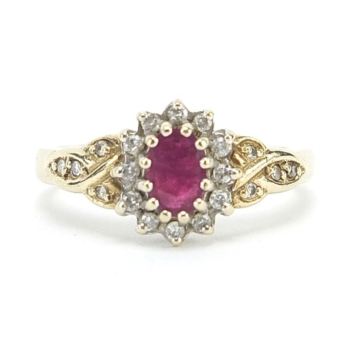 1897 - 9ct gold diamond and ruby cluster ring with diamond set shoulders, size N/O, 3.0g