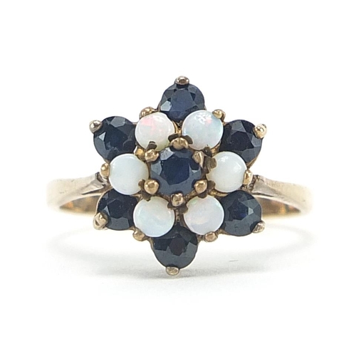 1913 - 9ct gold garnet five stone ring, size S, 2.9g