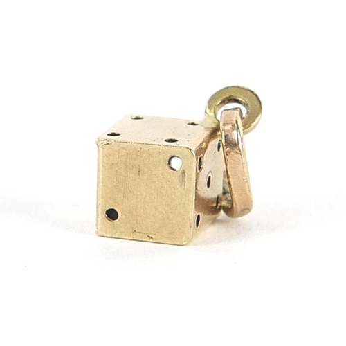 2082 - 9ct gold dice charm, 1.3cm high, 0.9g