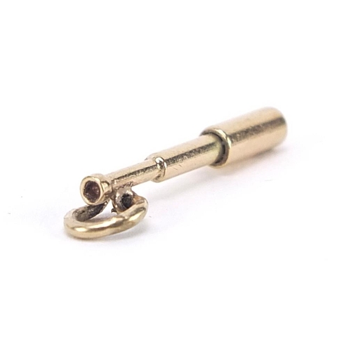 2013 - 9ct gold telescope charm set with a diamond, 2.0cm high, 0.8g