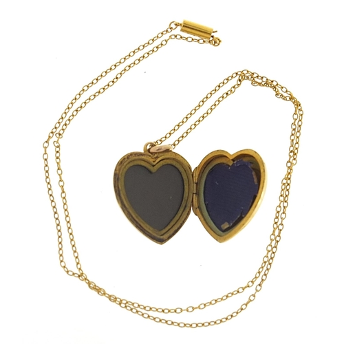 1827 - Yellow metal love heart locket set with a pink stone and pearls on a 9ct gold necklace, 2.5cm high a... 