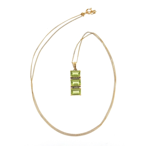 1944 - 9ct gold peridot and clear stone drop pendant on a 9ct gold necklace, 2.1cm high and 42cm in length,... 