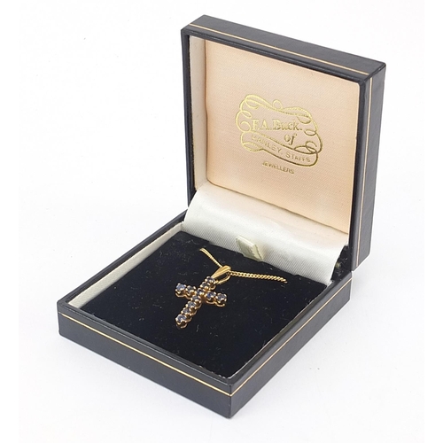 1700 - 9ct gold sapphire cross pendant on 9ct gold curb link necklace, 3.0cm high and 45cm in length