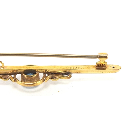 1745 - 9ct gold seed pearl and blue stone bar brooch housed in an H Samuel fitted box, 5.0cm wide, 2.1g