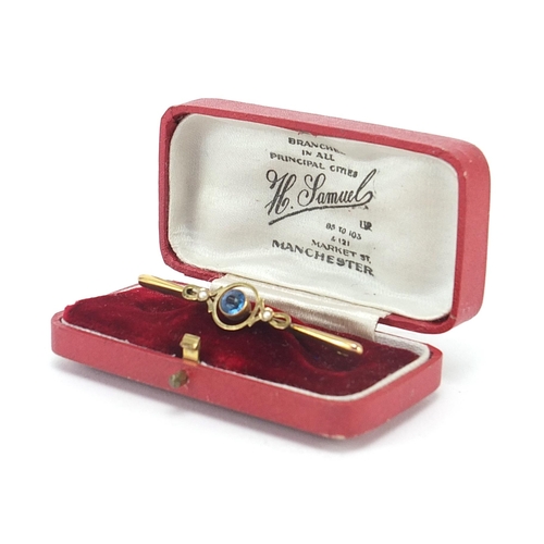 1745 - 9ct gold seed pearl and blue stone bar brooch housed in an H Samuel fitted box, 5.0cm wide, 2.1g